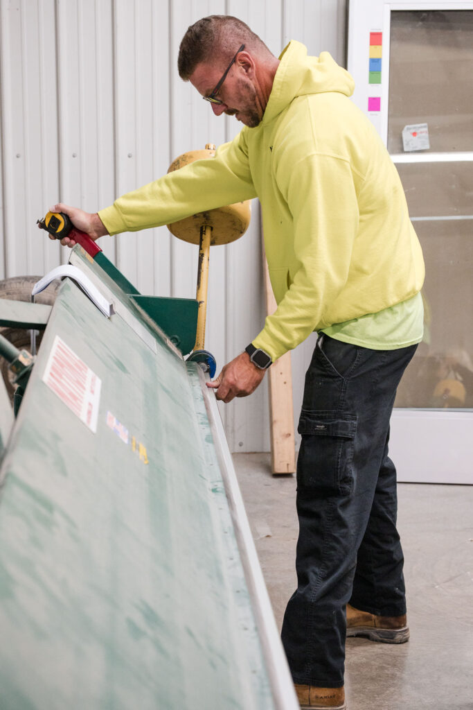Measuring for a commercial window repair