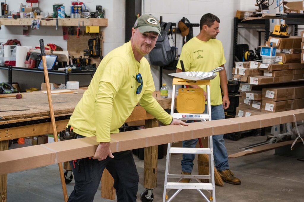 Moving glazing material through the fabrication shop